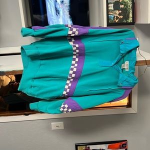 She’s a cute 80s look pull over!